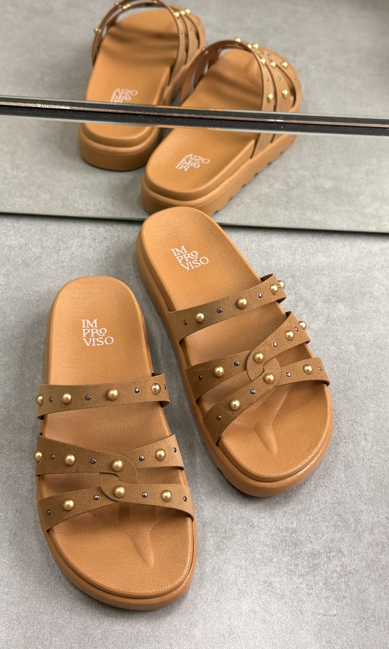 papete preta tira em x com detalhe dourado improviso