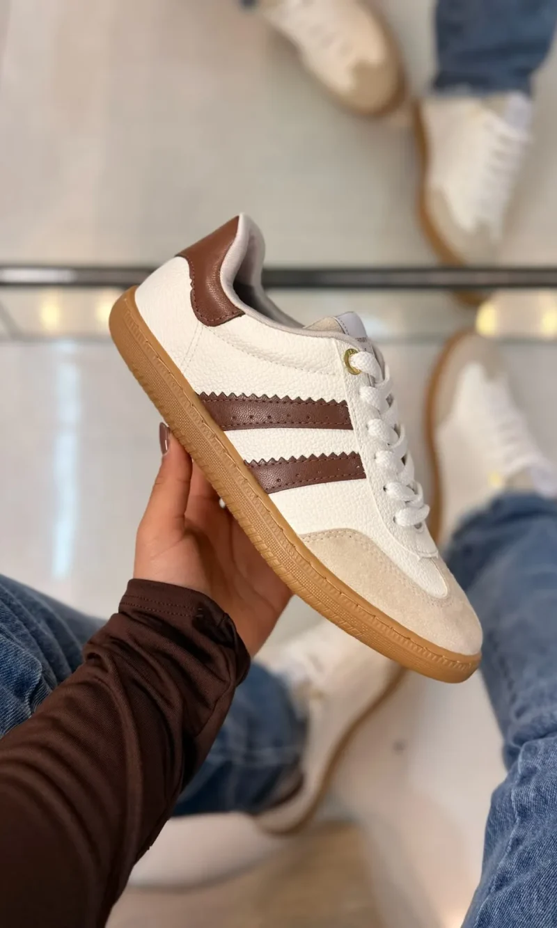 tênis casual feminino via marte branco com detalhes em preto e solado caramelo