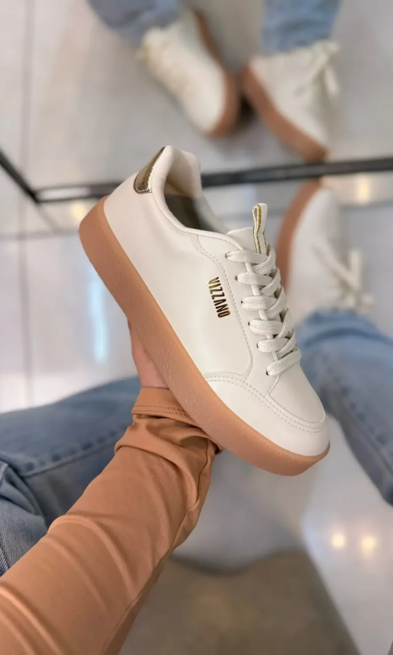 tênis casual feminino via marte branco com detalhes em preto e solado caramelo